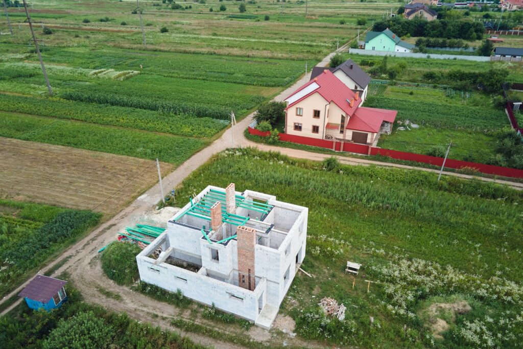 Aerial view of unfinished frame of private house